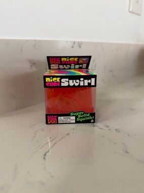 Nee Doh Nice Cube Swirl Squish Toy Orange Swirl